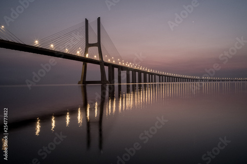 Vasco da Gama Bridge the longest bridge in Europe at Sunset. © Miguel