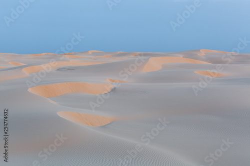 Desert white sand dunes near ocean at Anna Bay, New South Wales, Australia