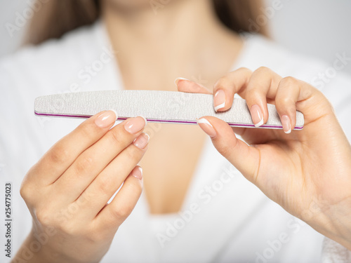 Photos Woman gets manicure procedure in a spa salon
