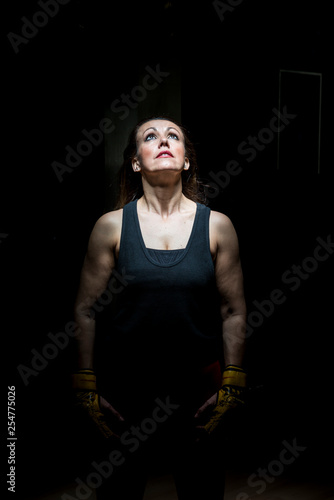 Portrait of a woman with boxing gloves