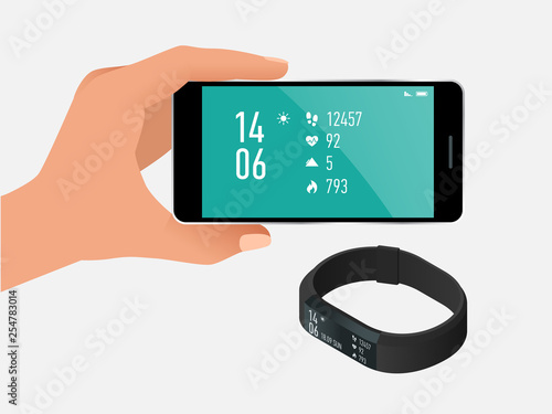 Fitness bracelet or tracker with a smartphone isolated on white. Sports accessories, a wristband with running activity steps counter and heartbeat pulse meter.