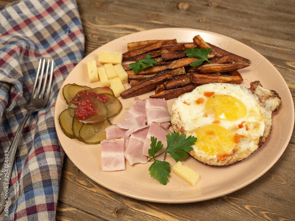 Breakfast fried eggs, bacon, potatoes