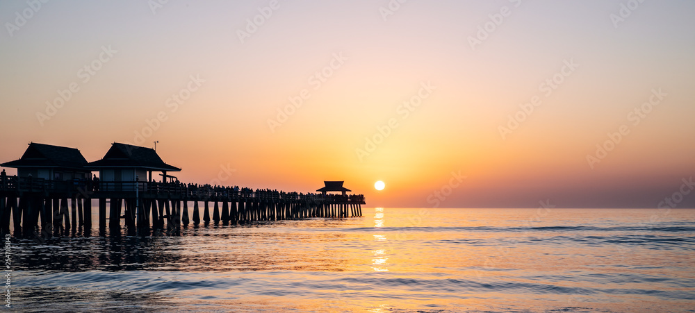 Sunset over the ocean. The reflection of the sun in the ocean. Sunset over the ocean. The reflection of the sun in the ocean.
