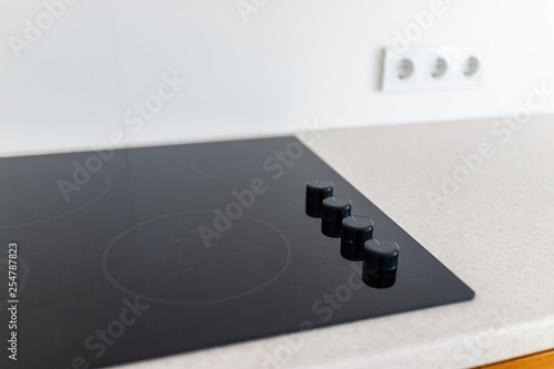Εκτύπωση καμβά Closeup and knobs on modern luxury electric cook stove top stovetop cooktop with