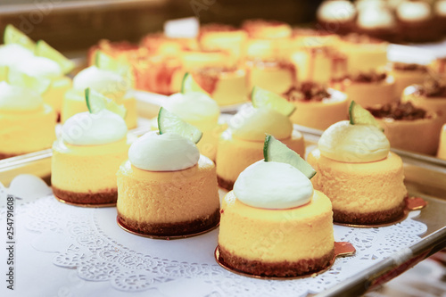 Vanilla Cheesecake pie desserts with cream slice of lime