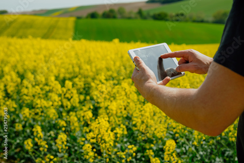 Farmer holding tablet