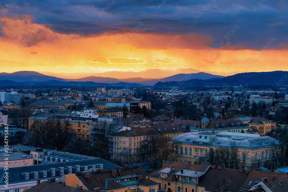 Beautiful sunset above Ljubljana old city and business downtown center