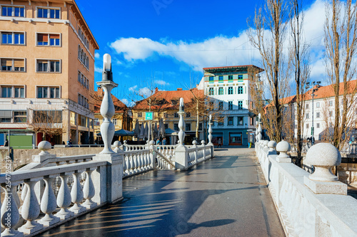 Triple Bridge over Ljubljanica River in Ljubljana old town street