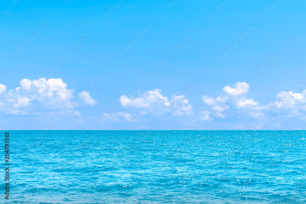  Natural tropical sea surface summer with blue sky background. Travel tropical Ocean sea.