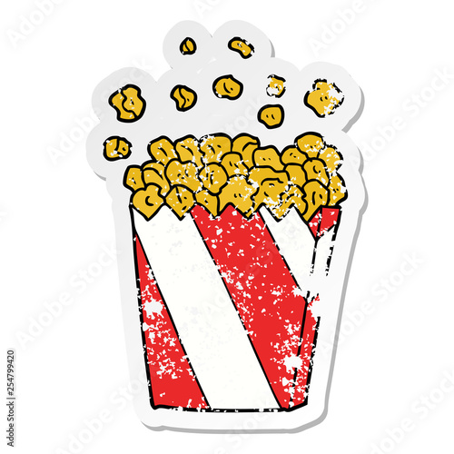 distressed sticker of a cartoon cinema popcorn