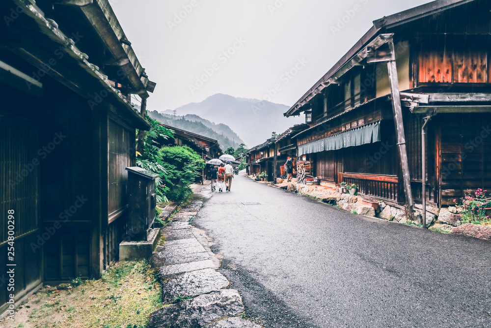 Kiso valley is the old  town or Japanese traditional wooden houses for the travelers walking at historic old street  in Narai-juku , Nagano Prefecture, JAPAN.