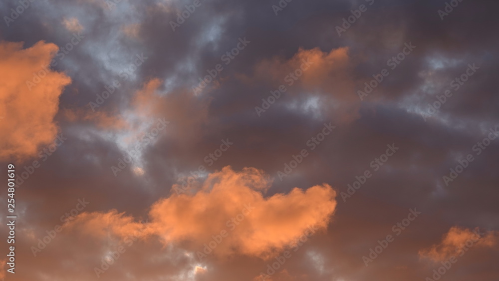 Dramatic orange and purple evening sky after a storm Dramatic orange and purple evening sky after a storm