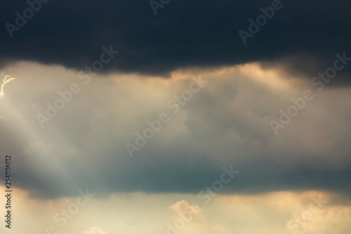 sunlight through cloud on dramatic sky after the rain