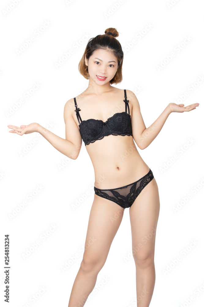 Chinese woman posing in panties and bra on white background Stock Photo