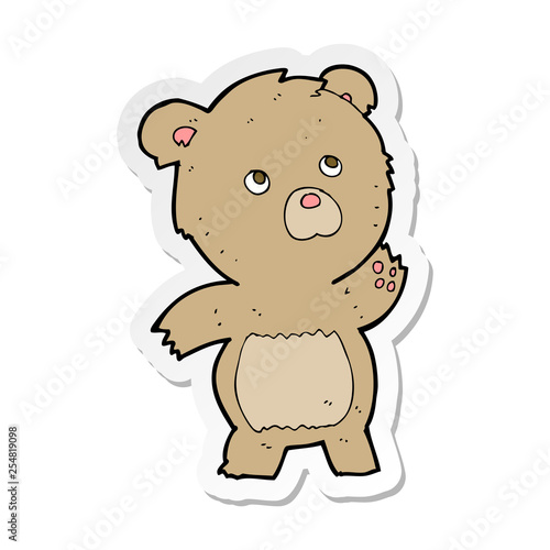 sticker of a cartoon curious teddy bear