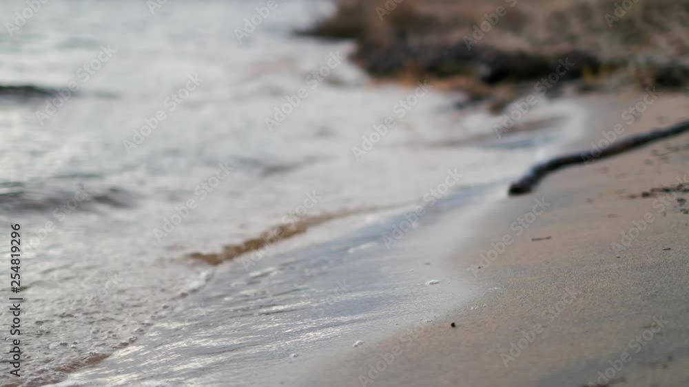 Slow Motion, Close Up beach Being Washed By Ocean Water Slow Motion, Close Up beach Being Washed By Ocean Water
