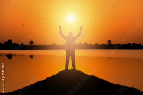 Silhouette of Man Celebration Success.