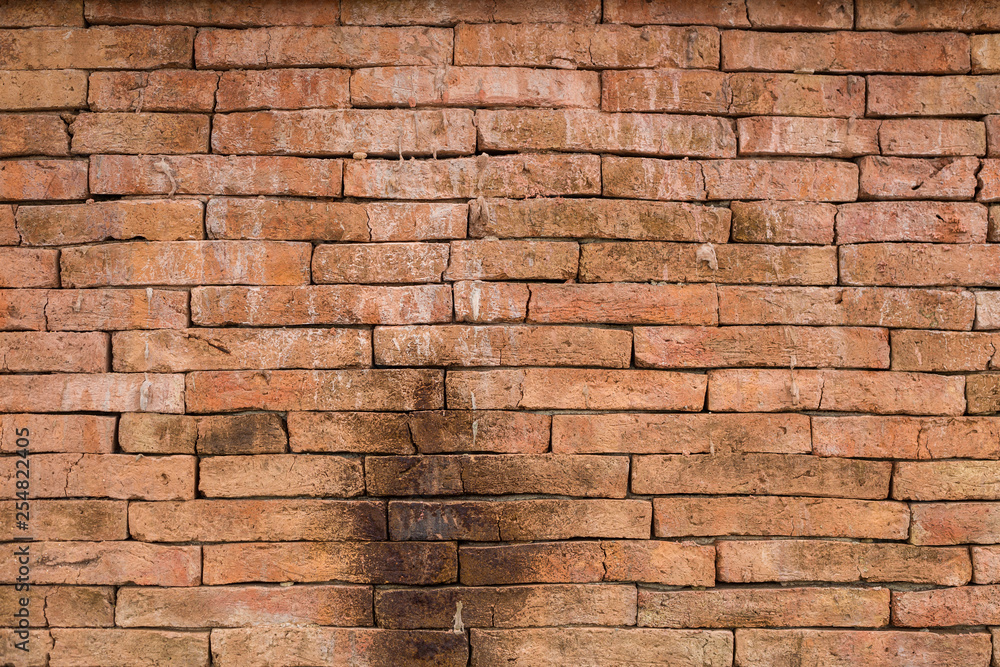 Fototapeta premium Red brown old brick wall texture background
