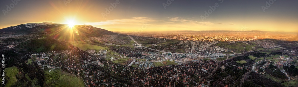Fototapeta premium Panorama of sunset over big city
