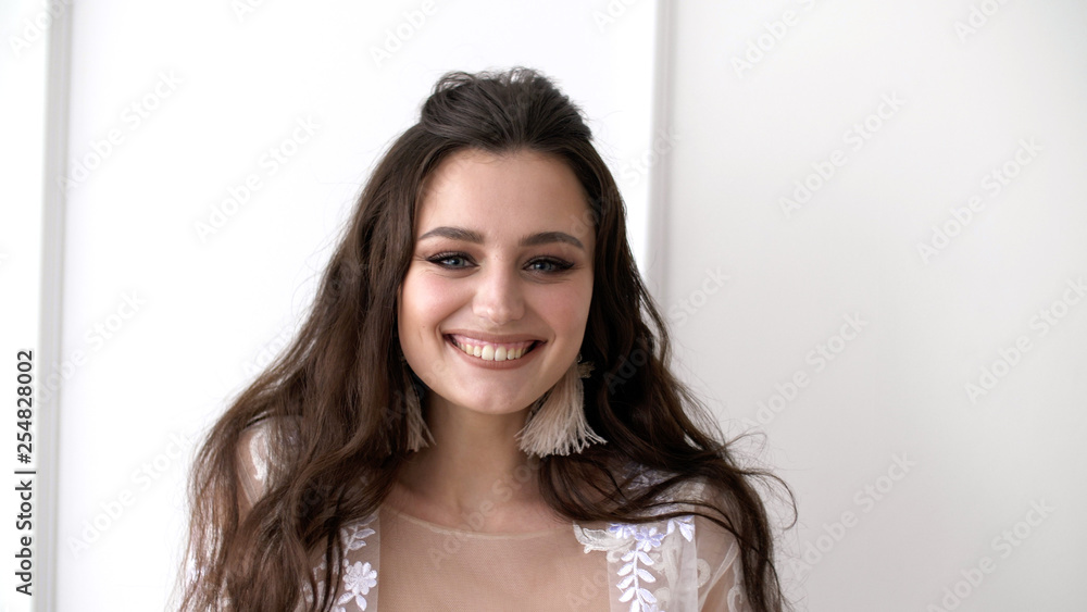 Close up portrait of attractive woman smiling brunette. Close up portrait of attractive woman smiling brunette.