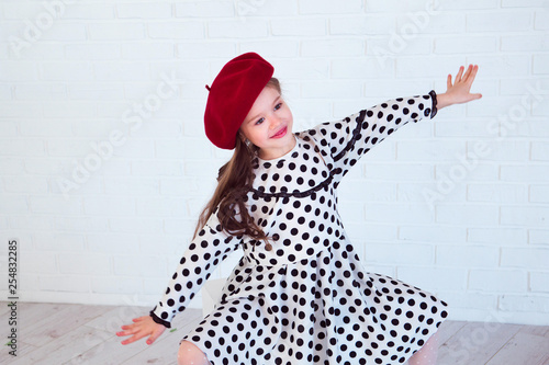 cute girl slylish polka dot dress photo