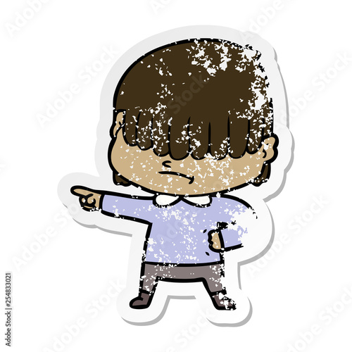 distressed sticker of a cartoon boy with untidy hair