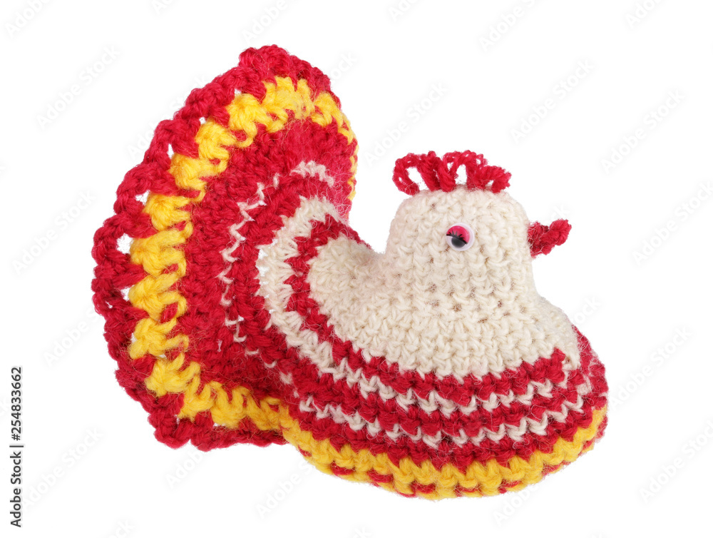 Funny  homemade rustic Easter chicken are made of thread and sit on egg isolated