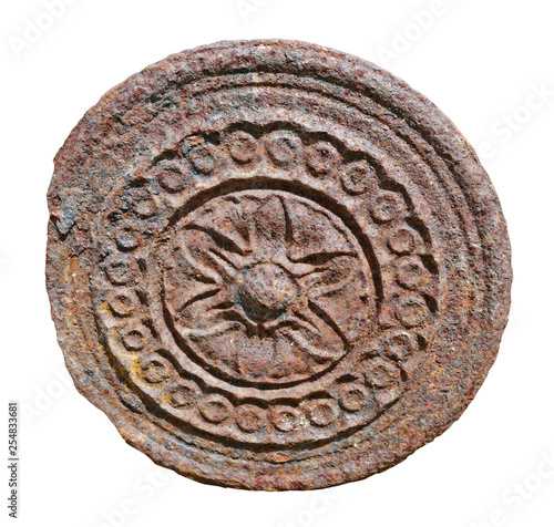 Rusty aged round  sun symbol from iron isolated