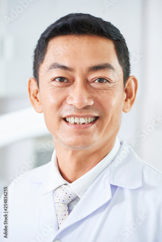 Asian mature doctor