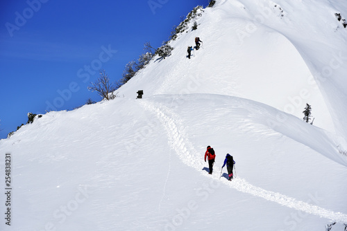 Japan's mountains with snow. Trekker to the summit of Mt.Hotakayama at Gunma Prefecture.  © KnoB