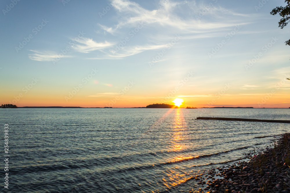 Fototapeta premium Sunset over Lake Saimaa, Finland
