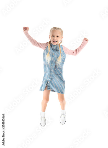 Jumping cute girl on white ...