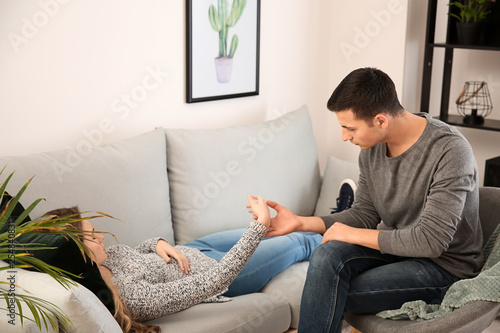 Male psychologist working w...