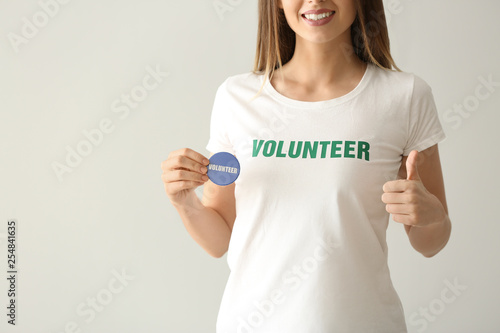 Young female volunteer with...