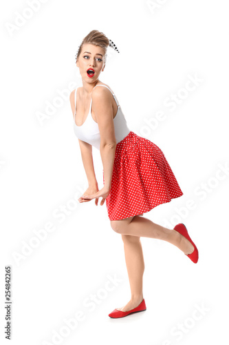 Surprised pin-up woman on w...