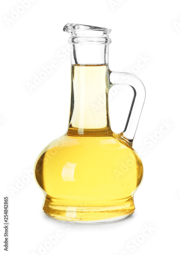 Jug with oil on white background