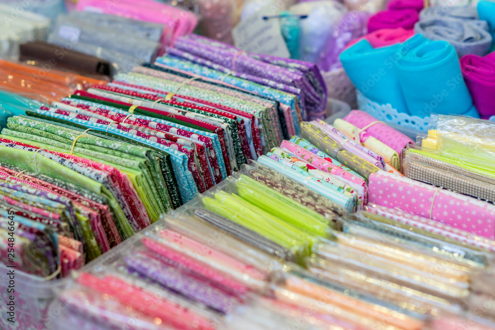 Assortment of natural fabrics and textiles. DIY materiials for craft and scrapbooking. Sewing industry concept
