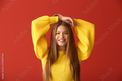 Beautiful young woman with ...