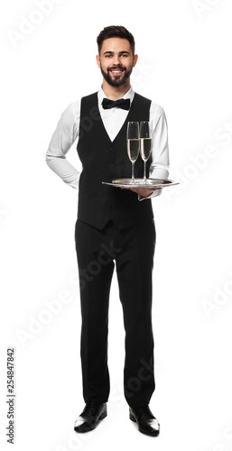 Handsome waiter with glasse...