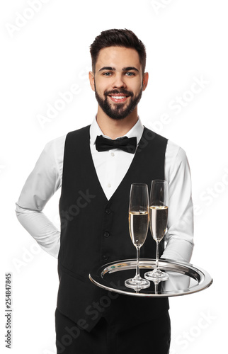 Handsome waiter with glasse...
