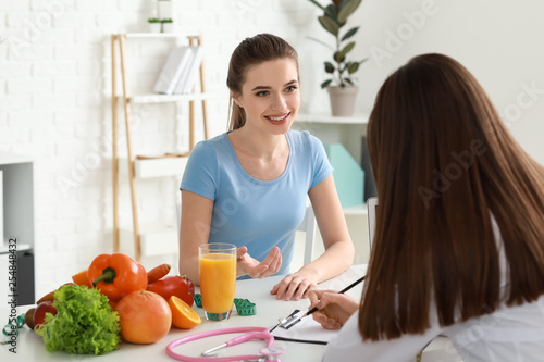 Young woman visiting nutrit...