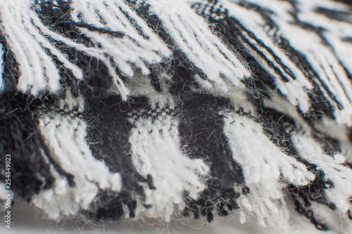 black and white wool fabric with fringe