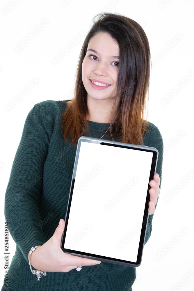 Woman standing with blank screen tablet in her hands Woman standing with blank screen tablet in her hands