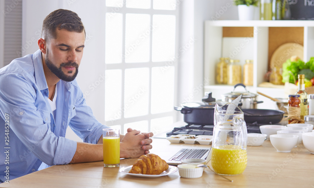 a business man breakfasts with notebook and juice a business man breakfasts with notebook and juice