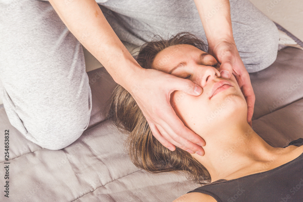 Fototapeta premium man and woman on the floor Thai yoga massage, stretching and gymnastics, sports and health