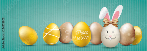Frohe Ostern Vintage Banner mit einem Osterhasen und goldenen Ostereiern