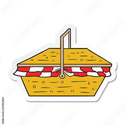 sticker of a cartoon picnic basket