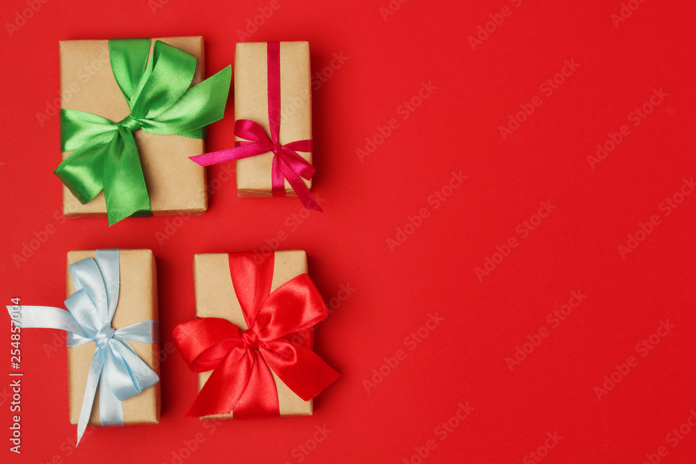 Gifts packed with craft paper and colorful satin ribbons Gifts packed with craft paper and colorful satin ribbons