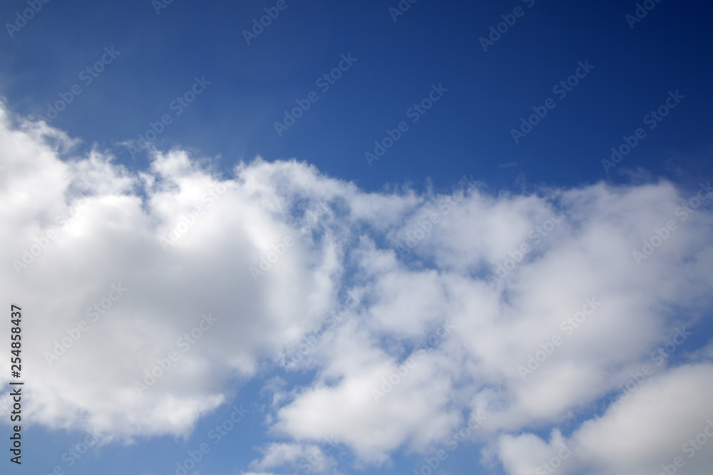 blue sky with cumulus clouds