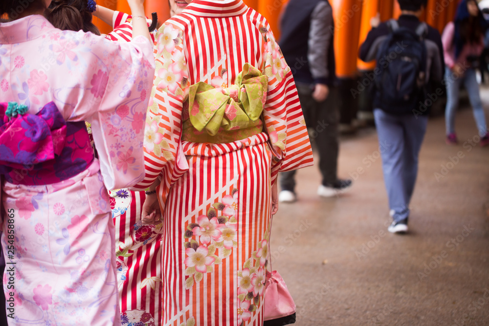 Naklejka premium Tourist women wear fashion of gimono traditional japanese costume